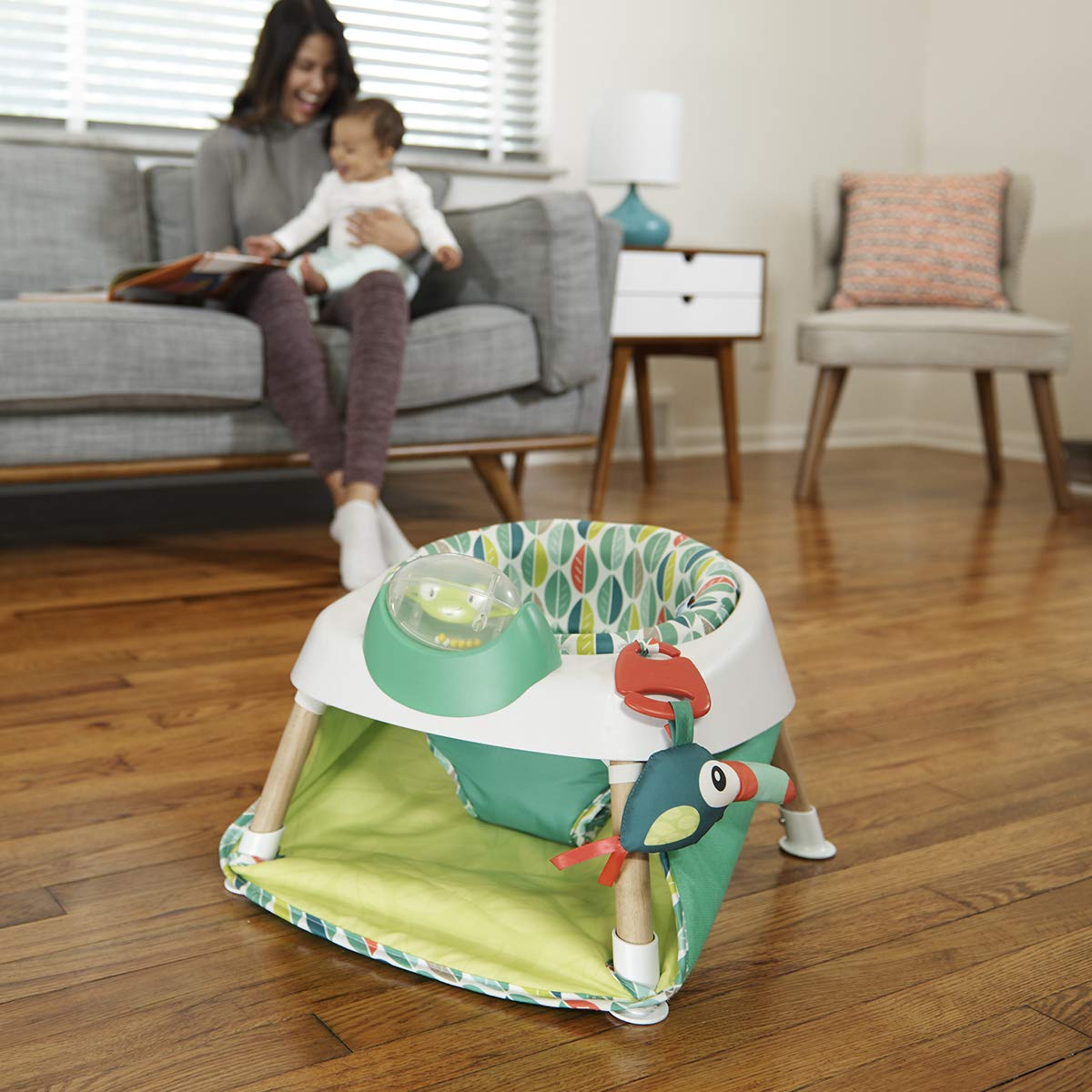 Evenflo Exersaucer Tiny Tropics tool-free setup for quick use.