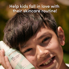 Child applying Evereden lotion during daily skincare routine.