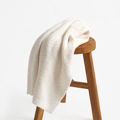 EVERGRACEHOME baby blanket draped on sofa to enhance cozy space
