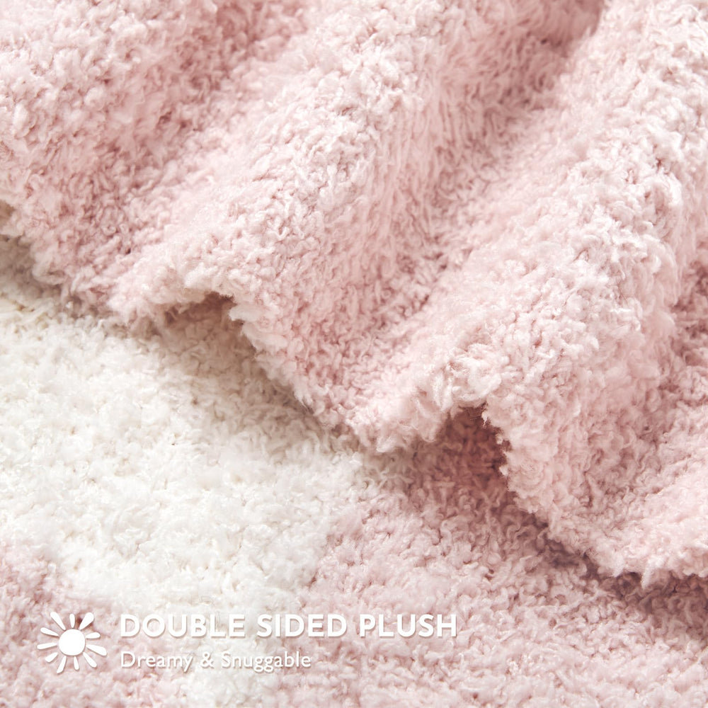 Blanket draped over sofa from Evergracehome for living room decor and comfort