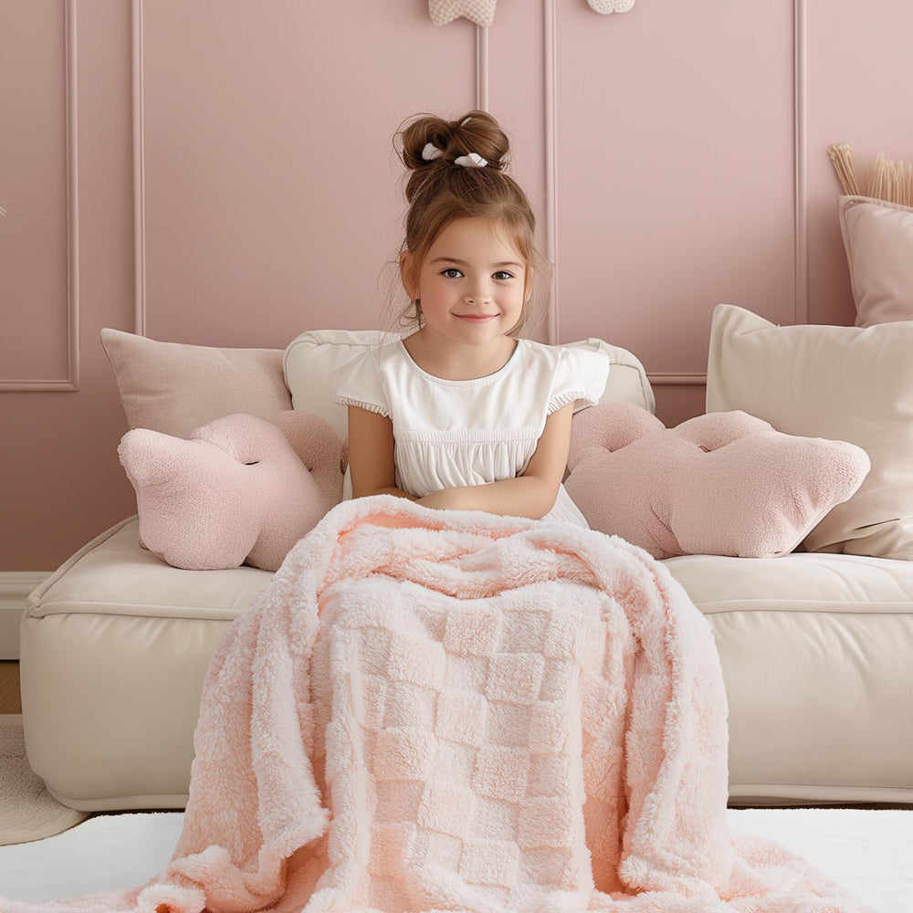 EverGraceHome checkered blanket in crib, soft surface for tummy time.