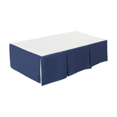 EVERYDAY KIDS 14-inch drop crib skirt keeps storage concealed neatly.