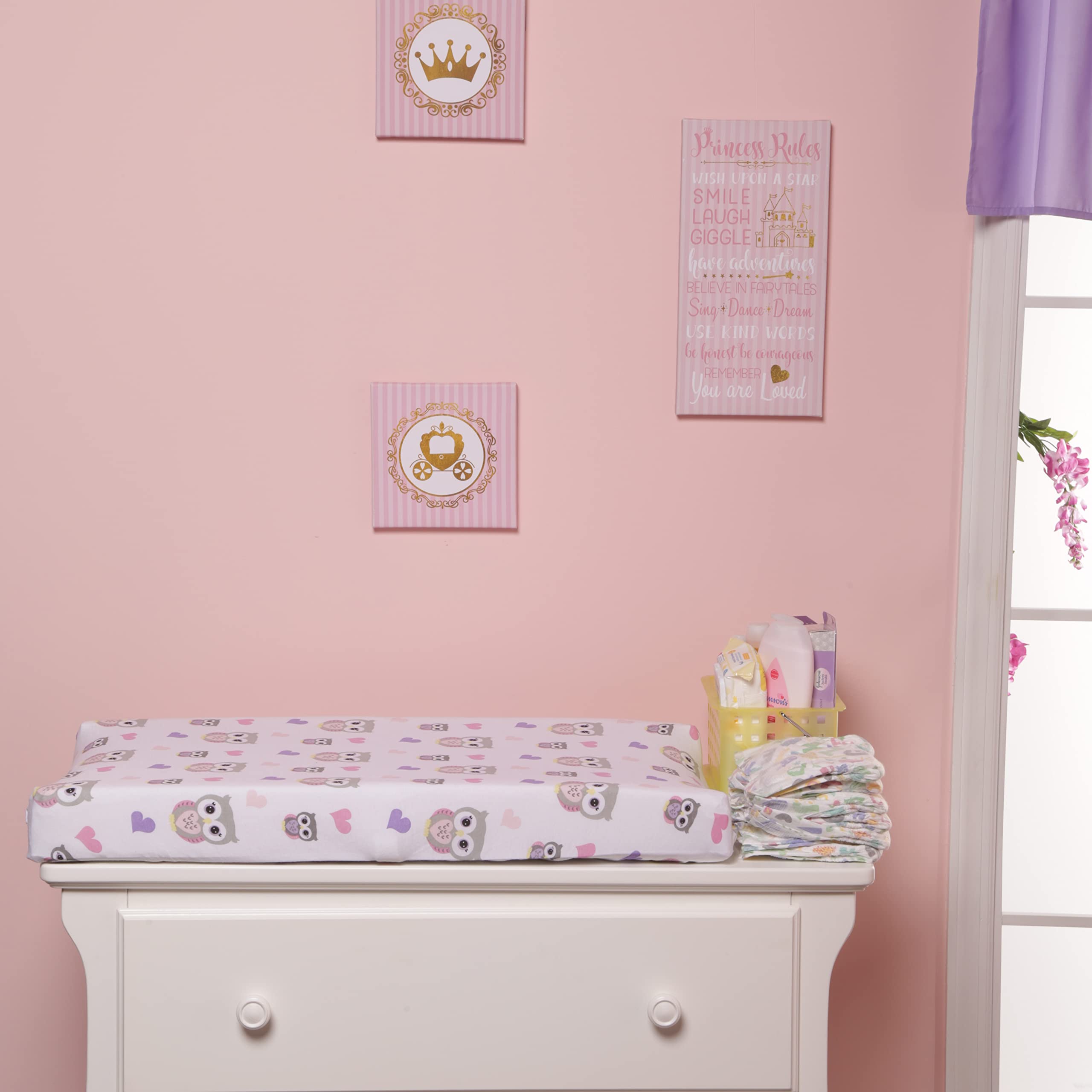 EVERYDAY KIDS changing pad cover with elastic edges for secure fit.
