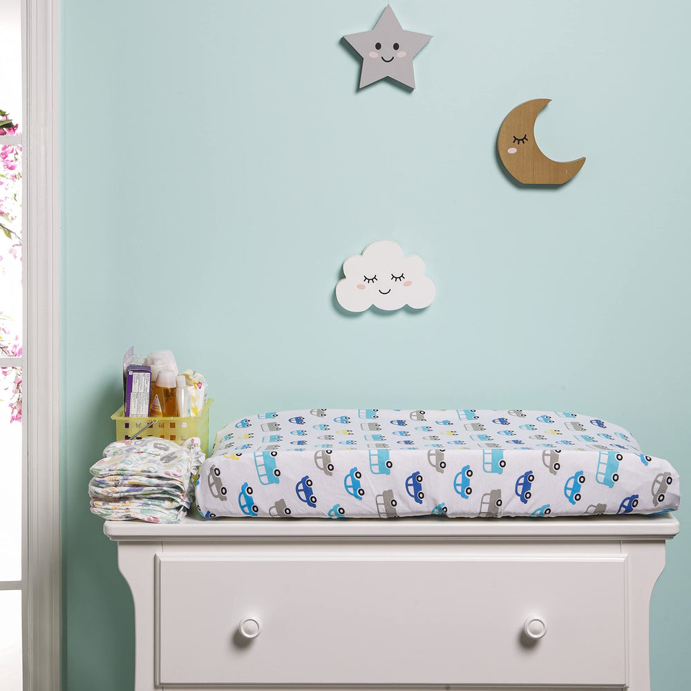 EVERYDAY KIDS elastic-fit pad cover stays in place on most changing mats.