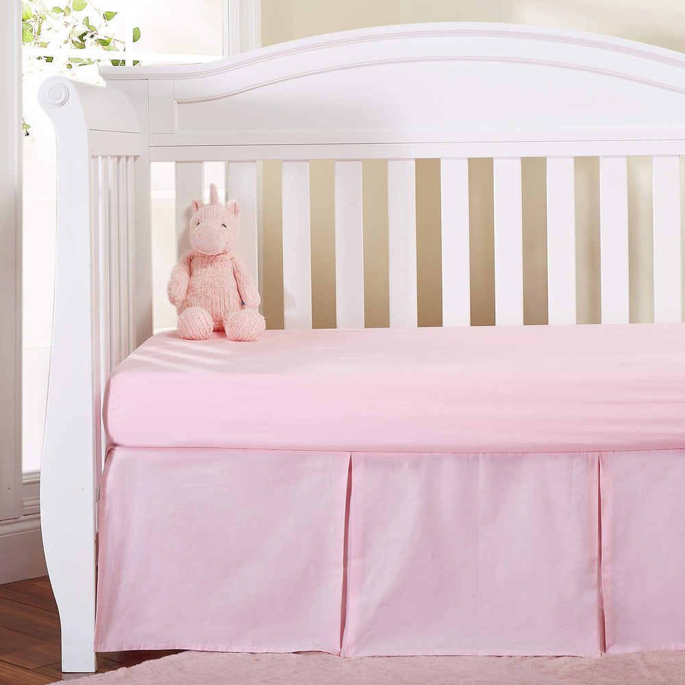 EVERYDAY KIDS crib dust ruffle with split corners conceals under-crib storage neatly.