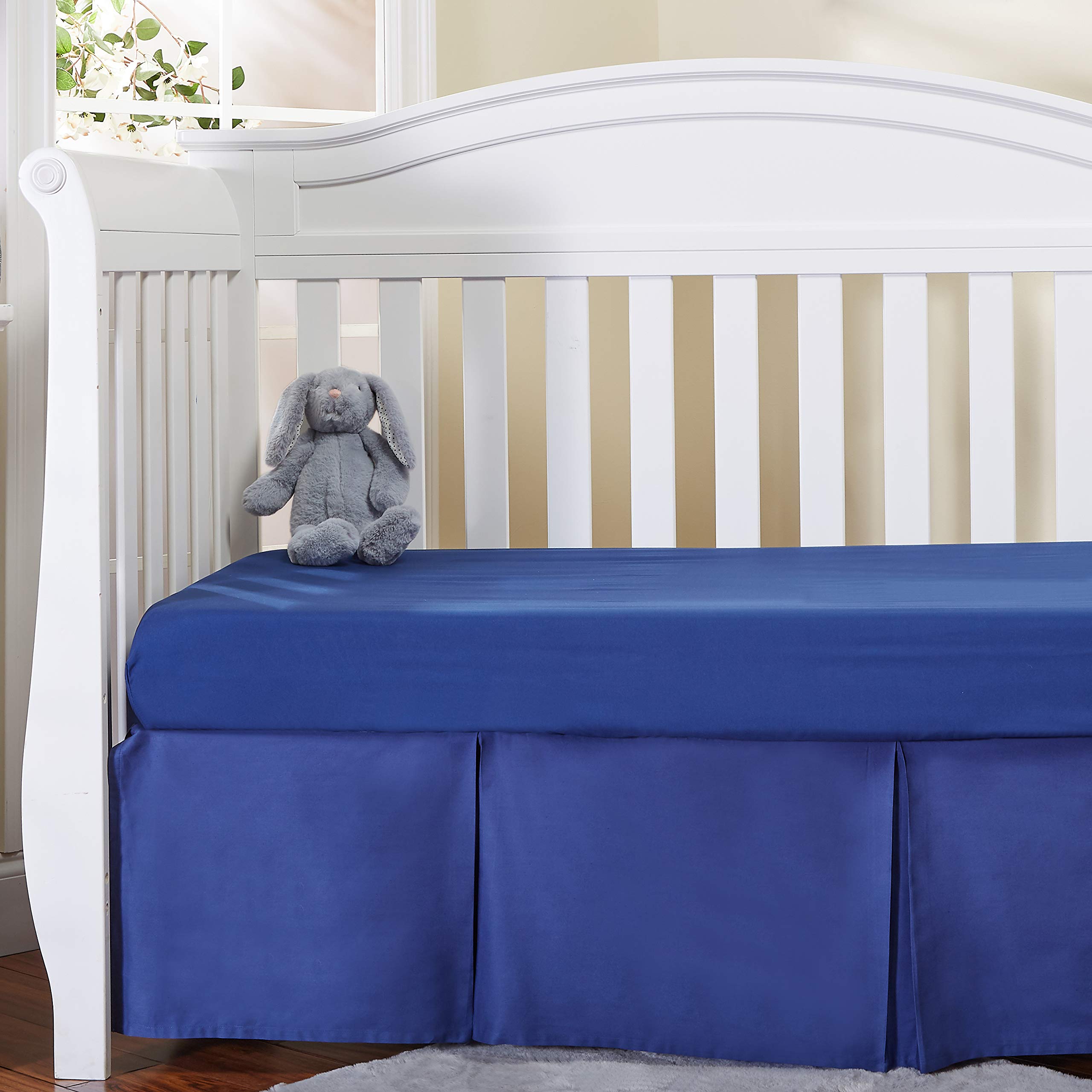 EVERYDAY KIDS split-corners crib skirt fits around posts with ease.