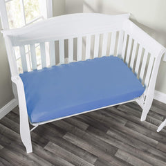 Everyday Kids fitted crib sheet with elastic trim demonstrates secure four-sided fit.