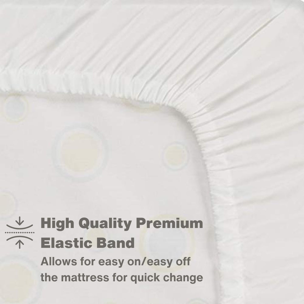 Everyday Kids white crib sheet on a standard 52x28 mattress in a nursery.