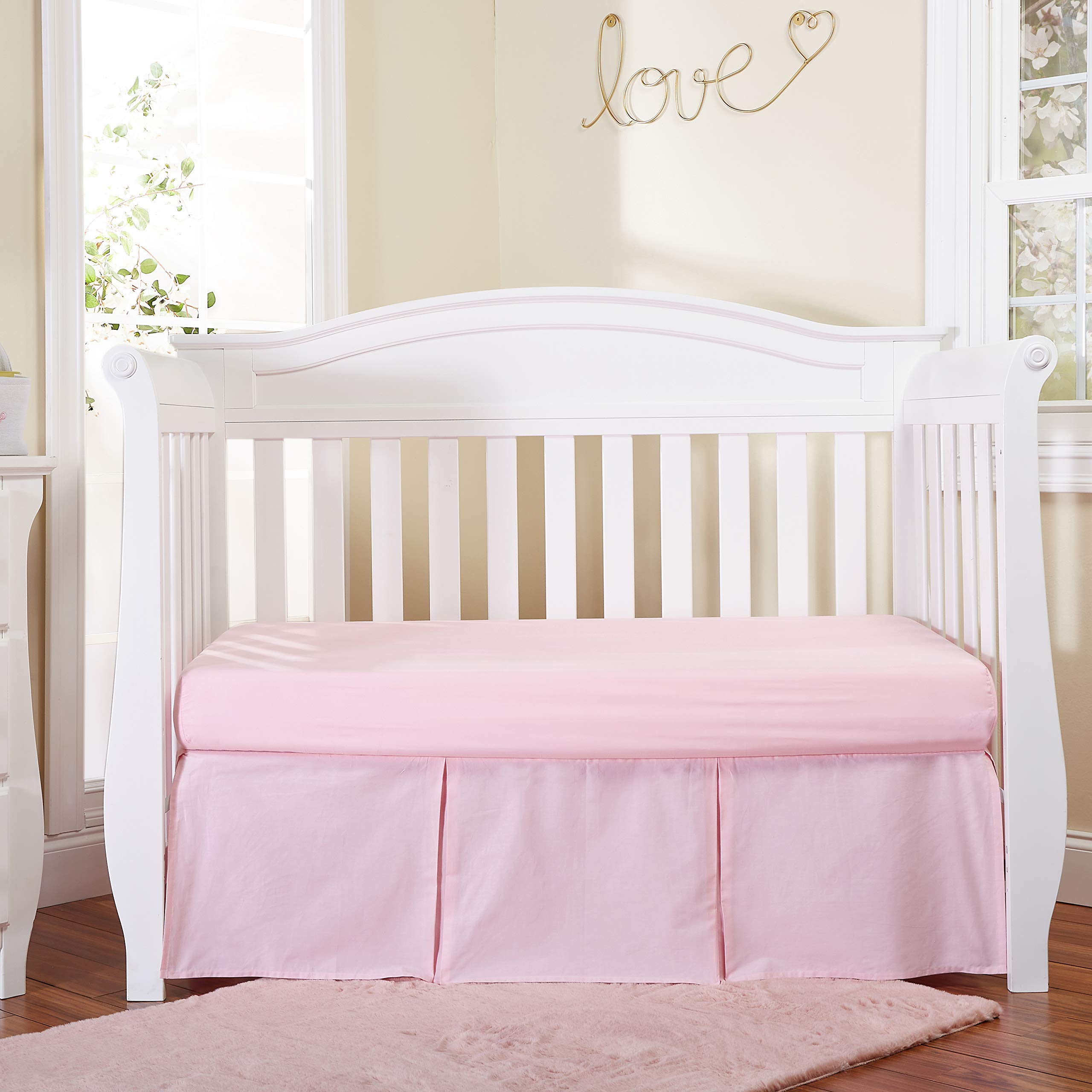 EVERYDAY KIDS light pink pleated crib skirt adds a soft, tidy look to the nursery.