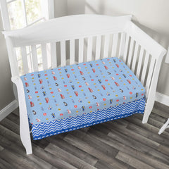 Everyday Kids Little Rescuer fitted sheet on crib demonstrates standard crib size fit.