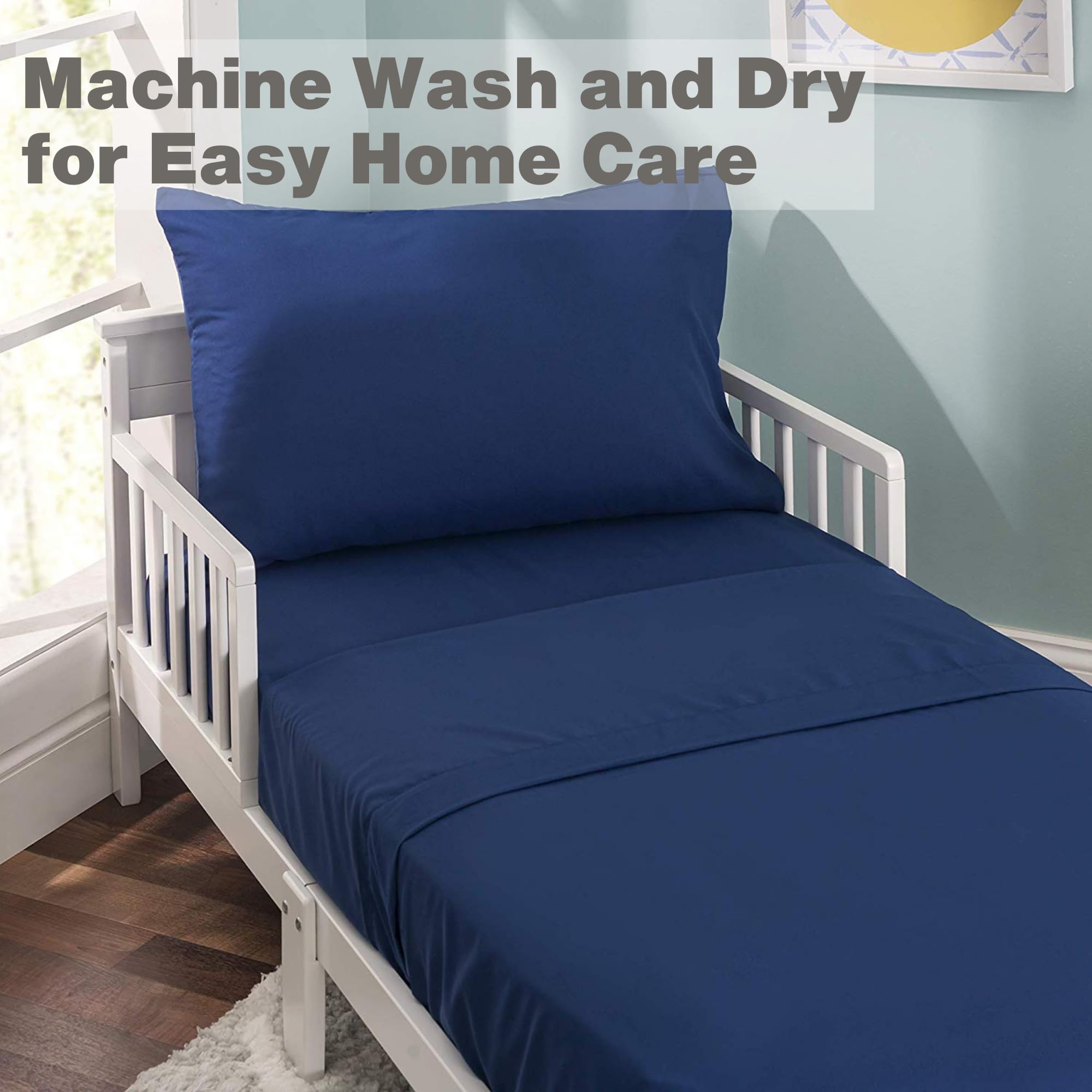 Everyday Kids solid navy sheets, ideal transitional bedding for crib to toddler bed.