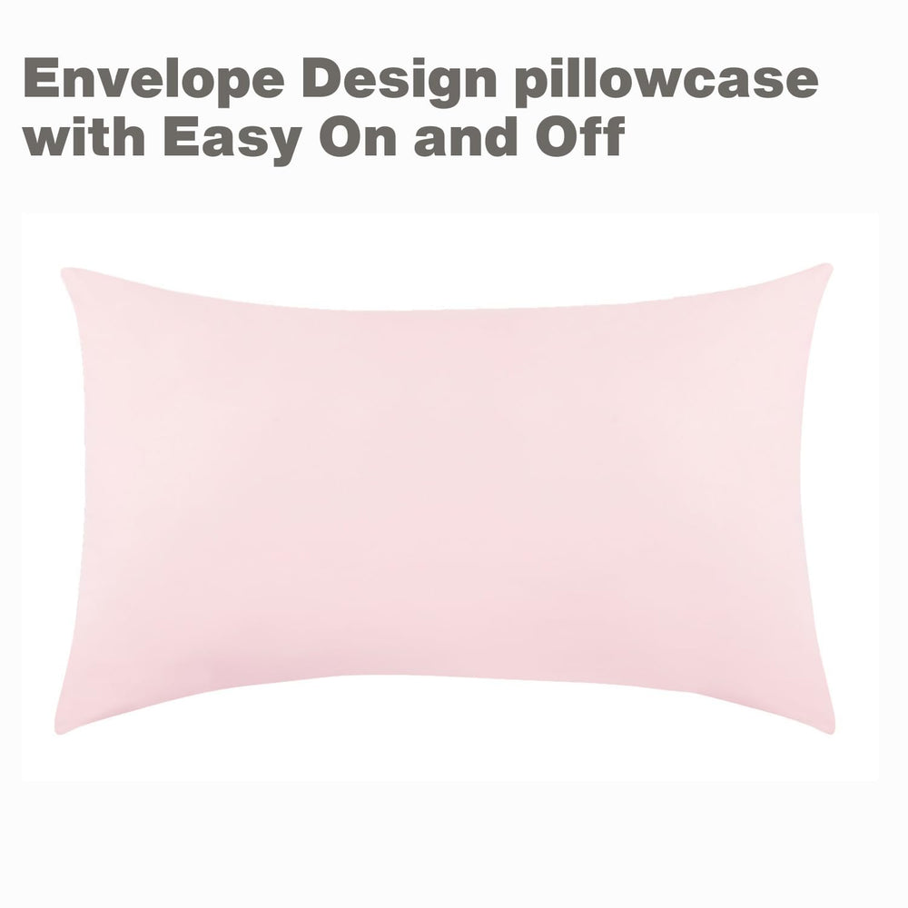 Everyday Kids pink bedding on a toddler bed demonstrates snug mattress fit