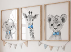 Eviepops Prints safari elephant with blue bow tie adds a playful focal point for a nursery.