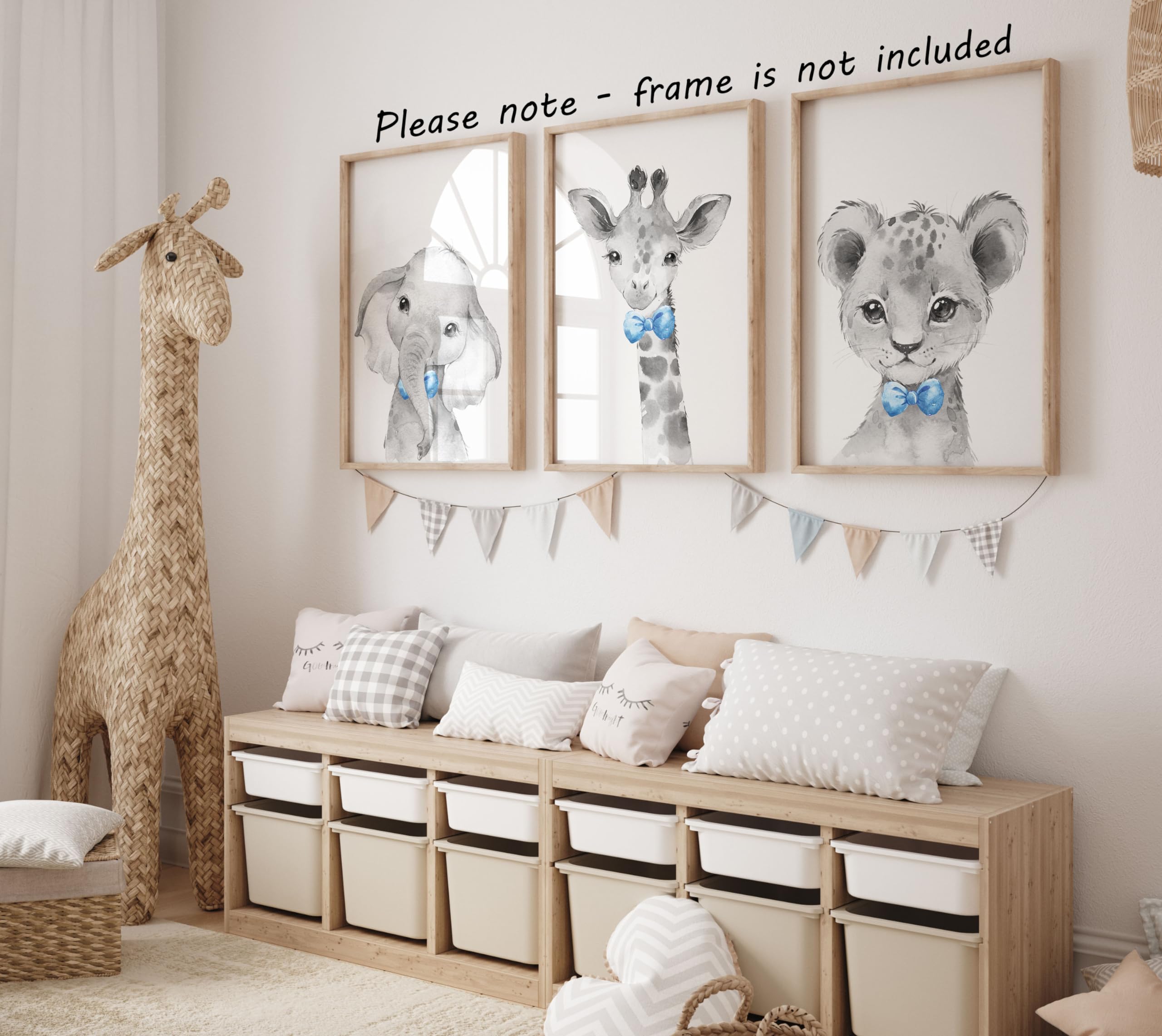 Eviepops Prints safari lion with blue bow tie introduces friendly safari vibes to a nursery.
