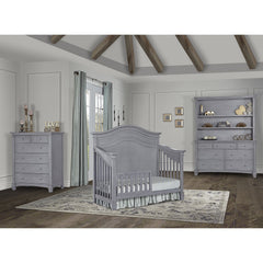 Evolur guard rail on crib shows solid wood durability and easy setup.