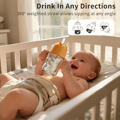 Evorie Tritan weighted straw sippy cup apricot handle-closeup highlights secure grip for toddlers.