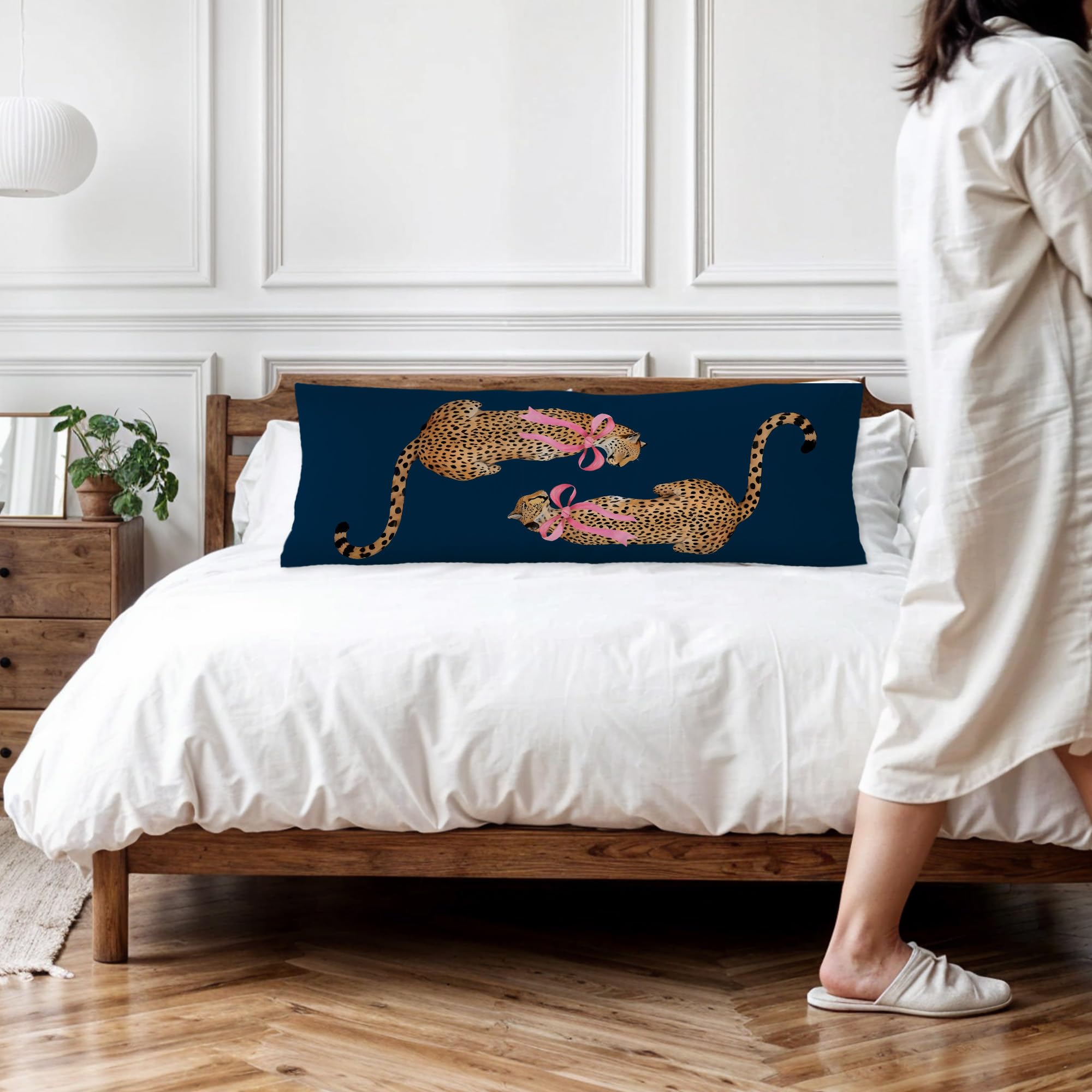 Exqcom navy blue leopard pillow cover creates a chic living space accent.