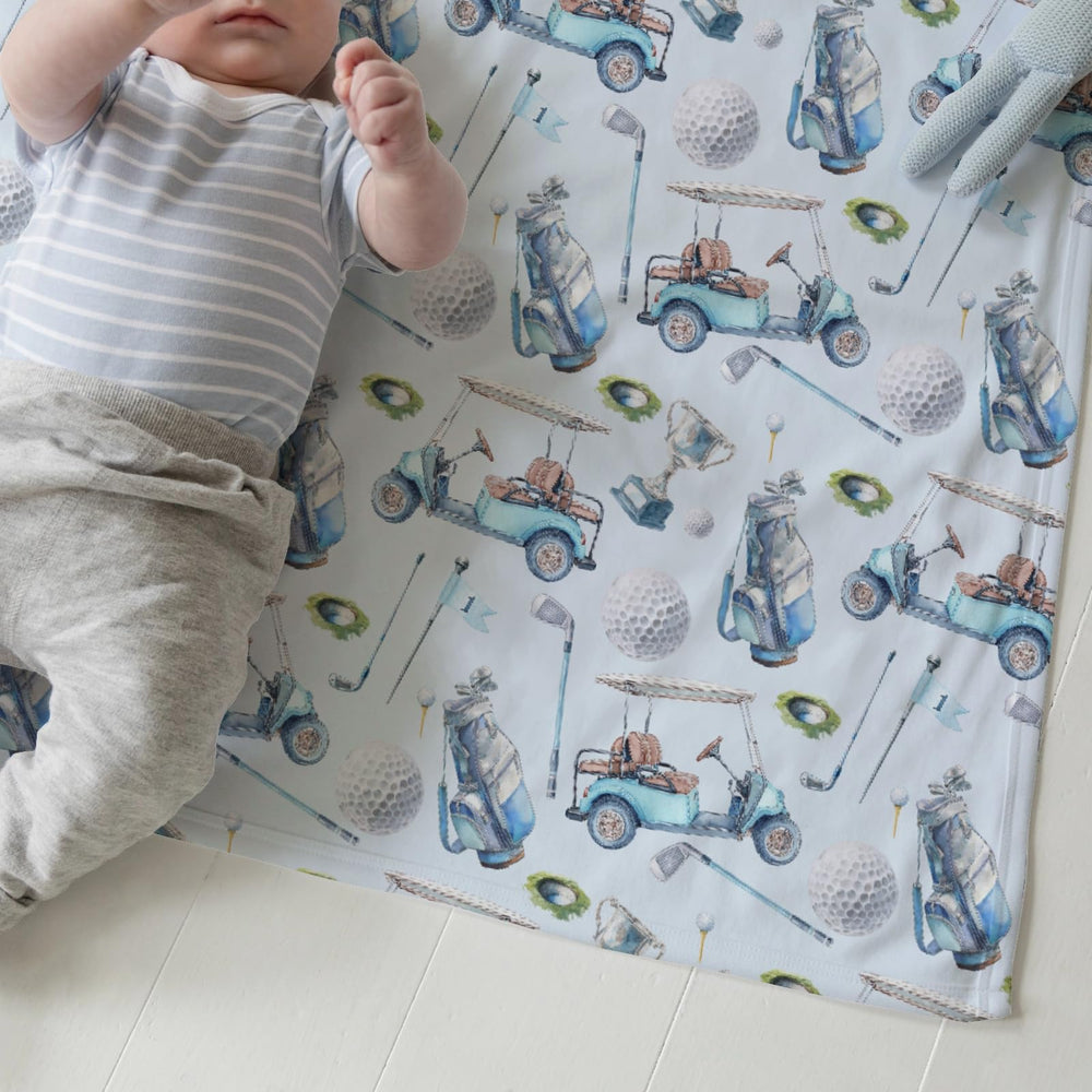 EyMzcod baby blanket used as swaddle and stroller cover.