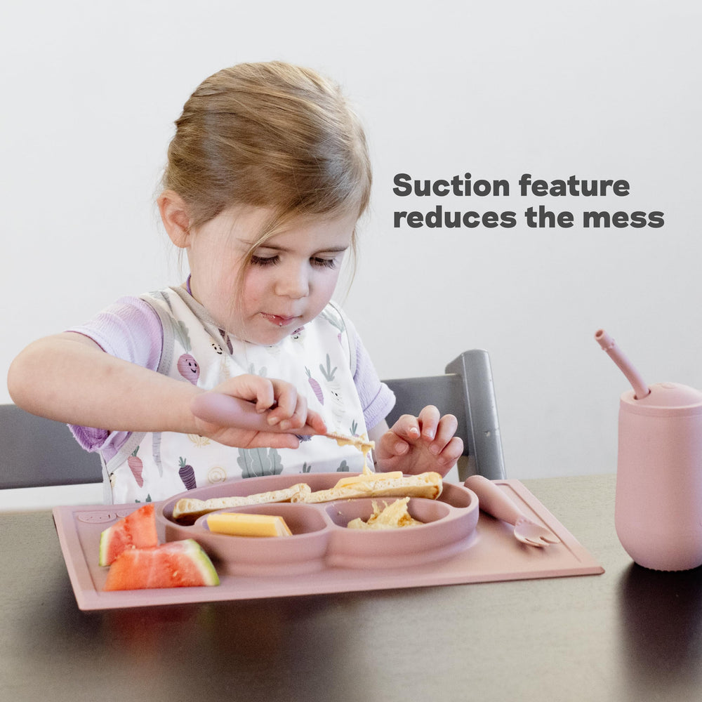 Ezpz Happy Mat promotes balanced meals with a three-compartment layout during meals.