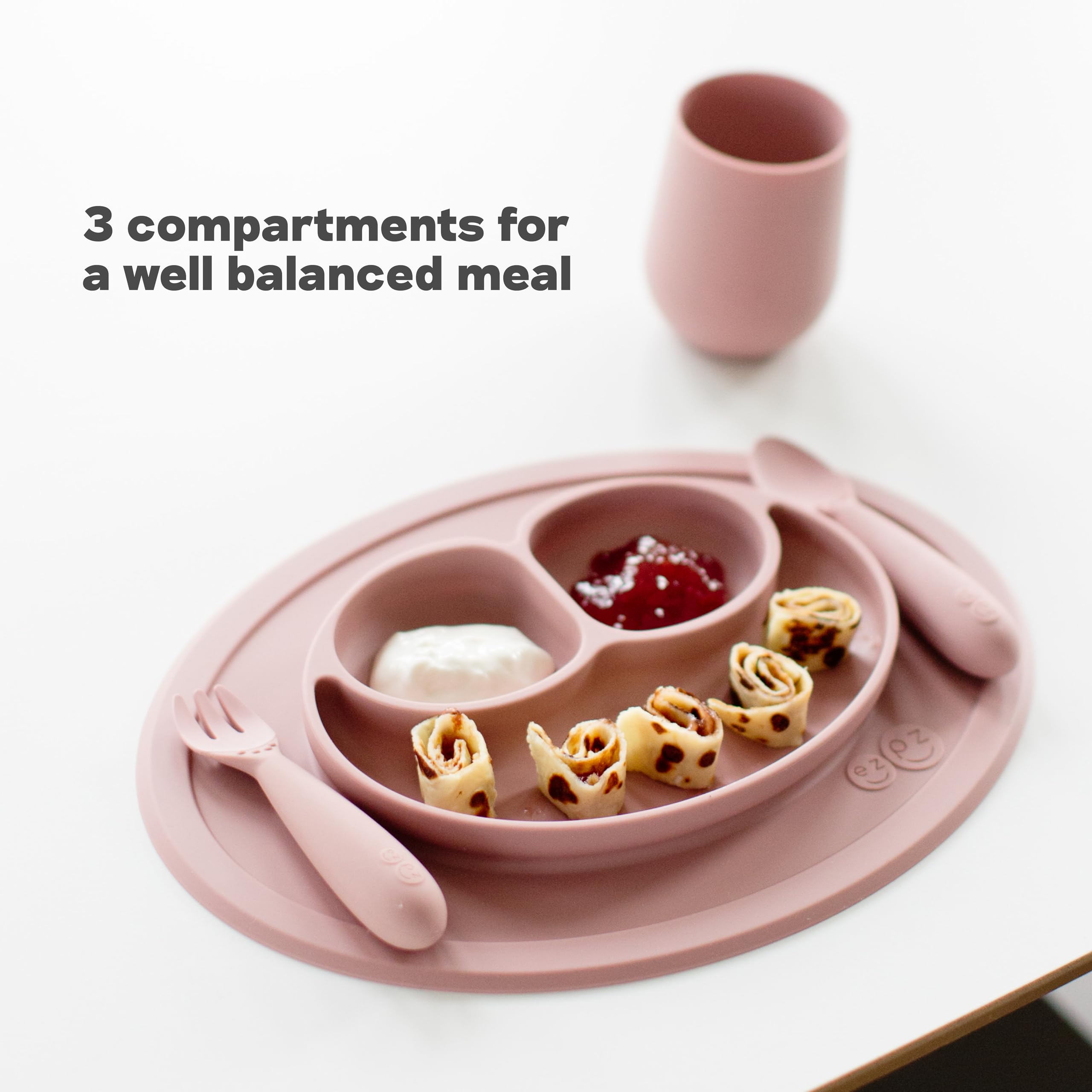 ezpz Mini Mat Sage travels easily for on-the-go meals