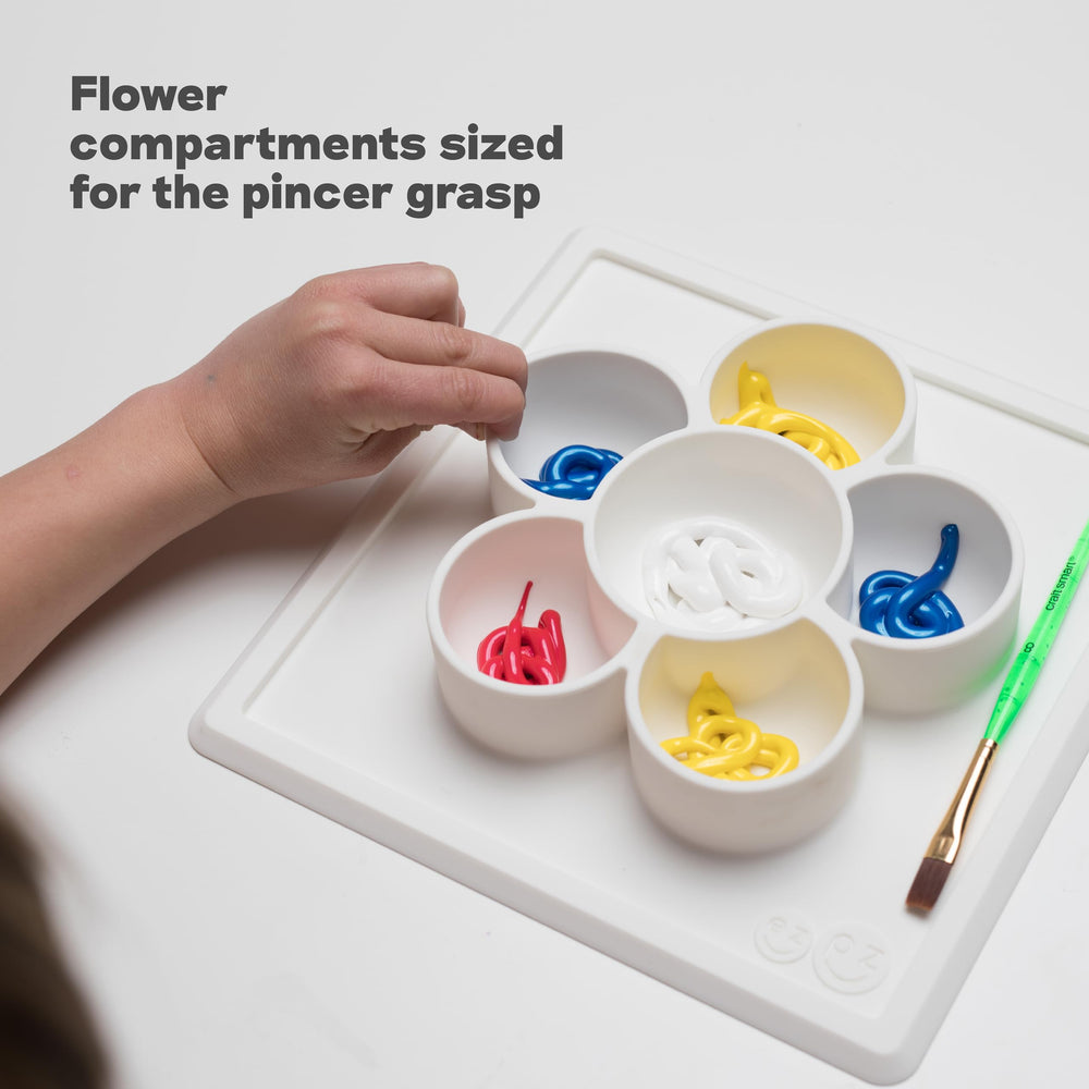 ezpz Mini Play Mat made from food-grade silicone, BPA-free and dishwasher safe.
