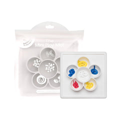 ezpz Mini Play Mat with suction plate keeps meals mess-free during play.