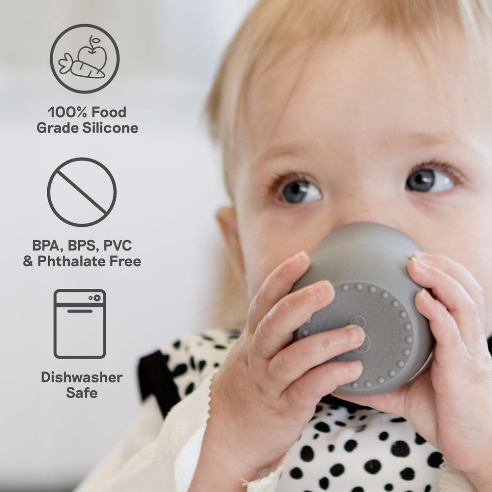 ezpz Tiny Cup Coral open-cup transition for learning to sip.