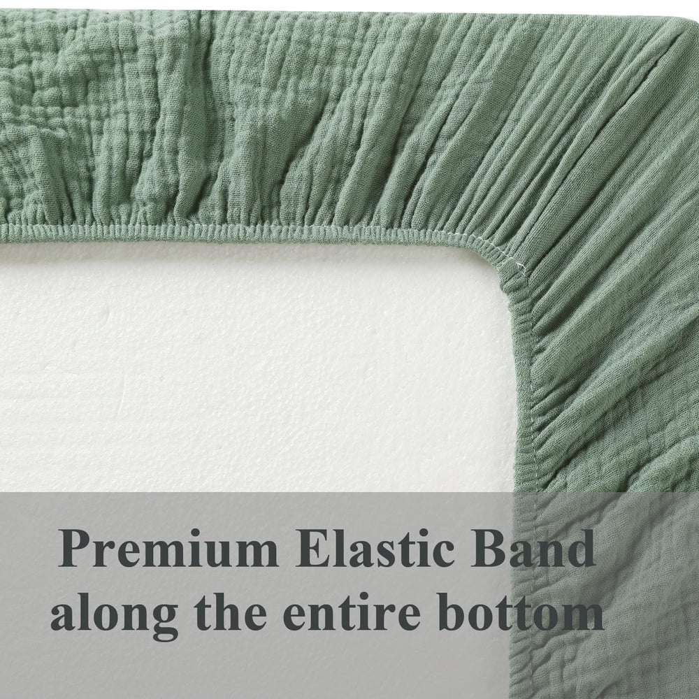 Two pack muslin bassinet sheets in green tones for easy rotation by Fadacudan