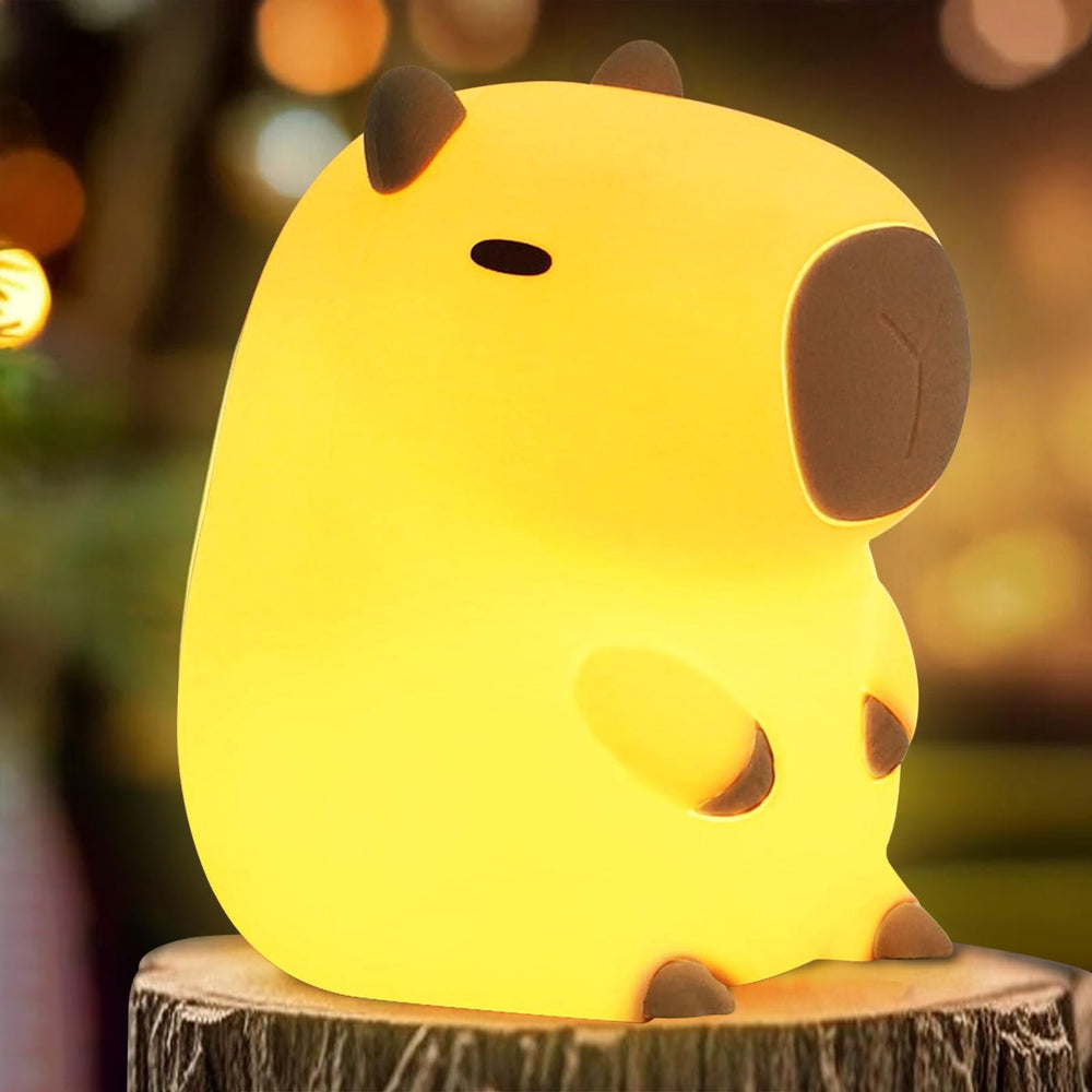 FAMIDUO Capybara Night Light glowing softly in a kid's room for bedtime ease