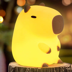 FAMIDUO Capybara Night Light glowing softly in a kid's room for bedtime ease