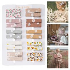 Fancy Clouds rose-pattern fabric alligator clip provides secure hold for fine hair.