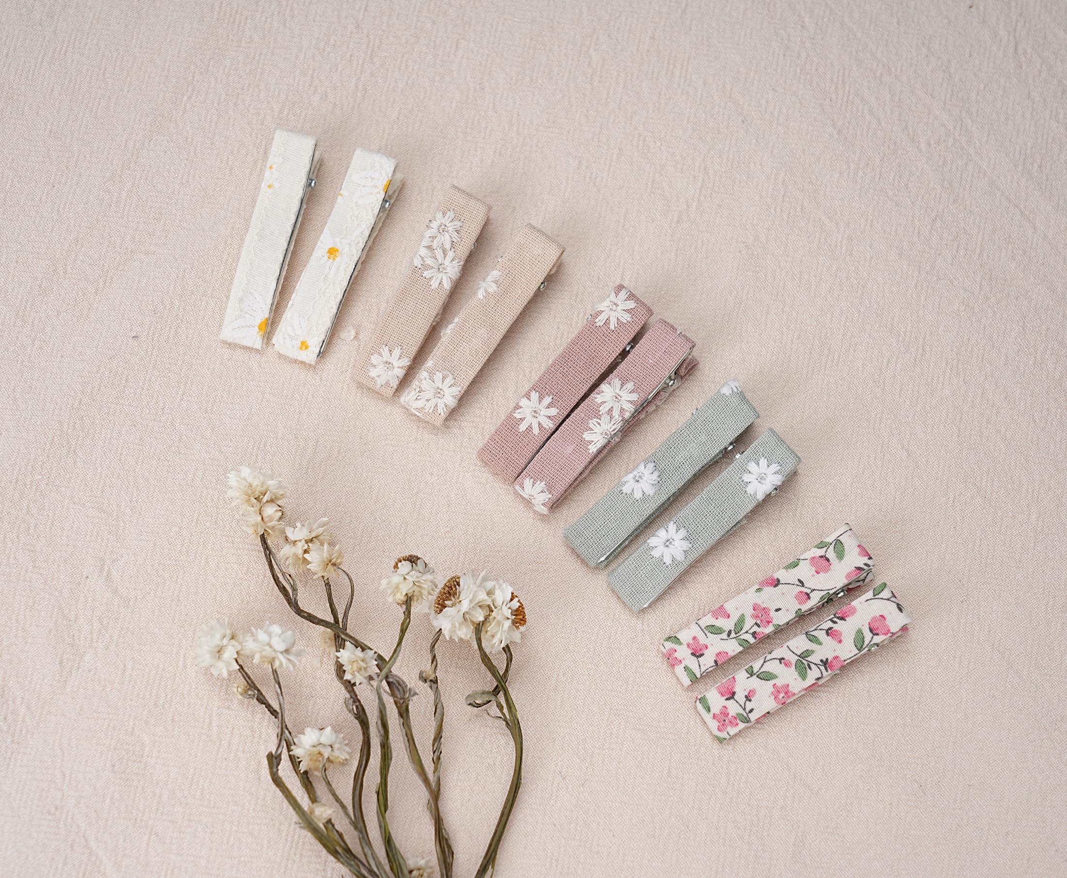 Fancy Clouds soft-petal fabric clip is lightweight for all-day wear.
