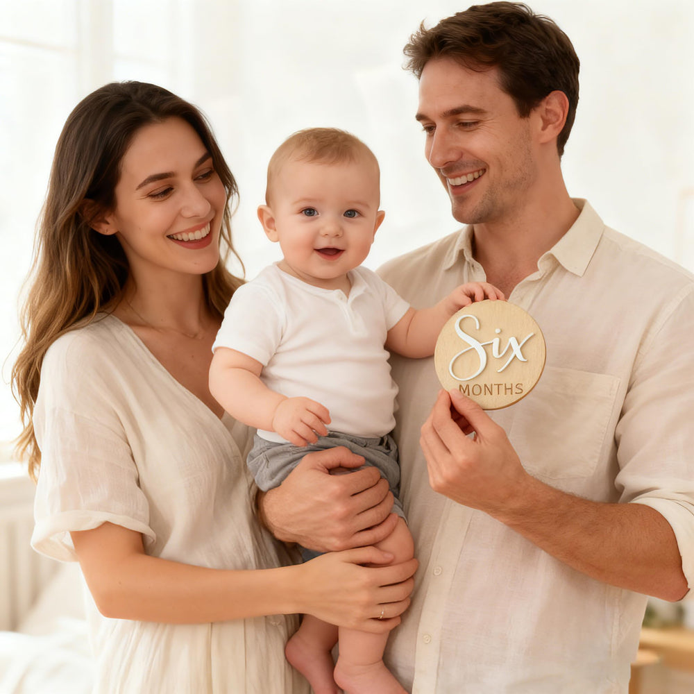 Fancy Swen durable wooden keepsake that captures a year of milestones.