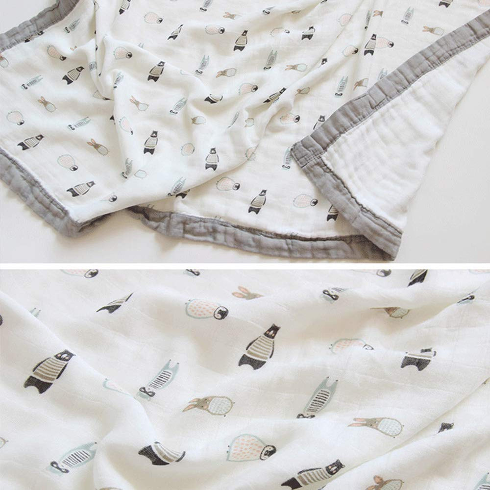 Farmer Mani swaddle gray wraps newborn securely and comfortably.