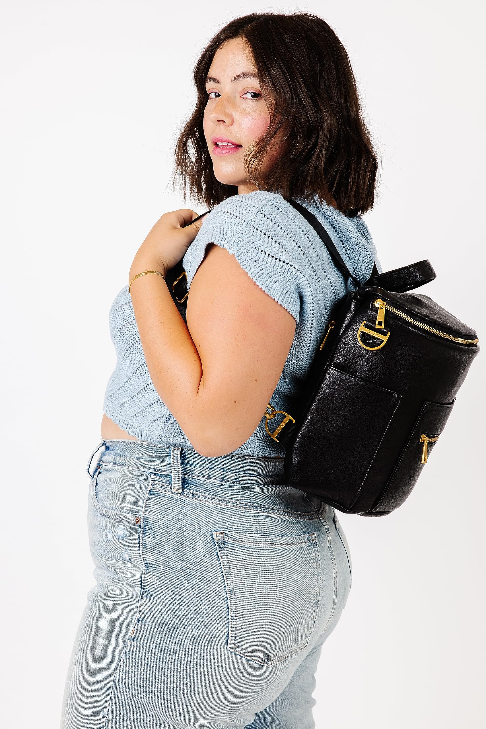 FAWN DESIGN Mini Diaper Bag top grab handle for easy grabbing on the go.