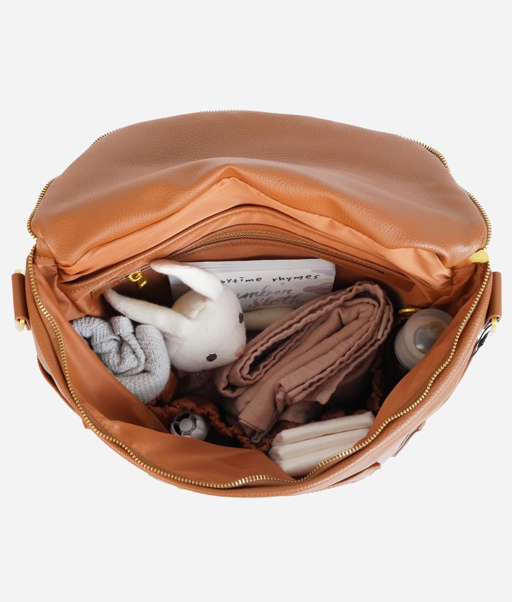 FAWN DESIGN backpack side pocket for easy bottle or accessory access.