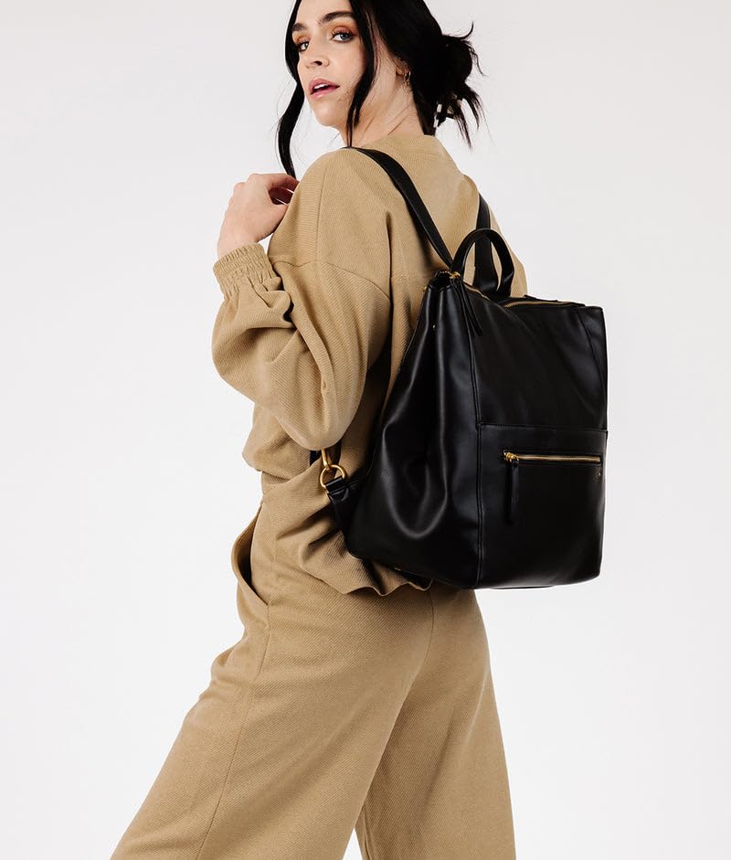 FAWN DESIGN Square Diaper Bag's water-resistant faux leather resists spills while cleaning easily.