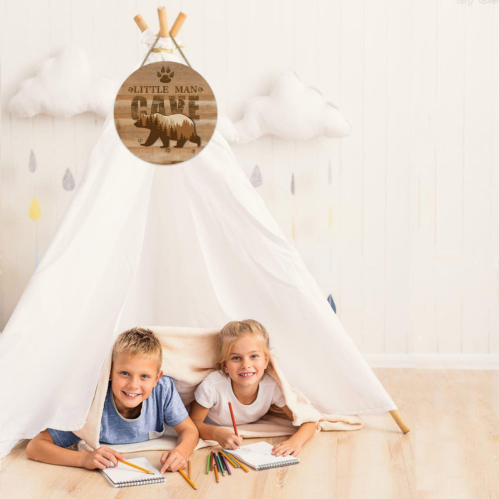 Fcimu rustic farmhouse style decor adds warmth to a toddler bedroom.