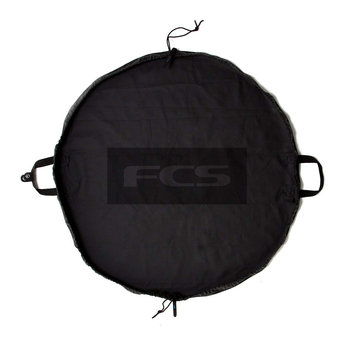FCS Change Mat rolled for compact storage, ideal for portable wetsuit changes