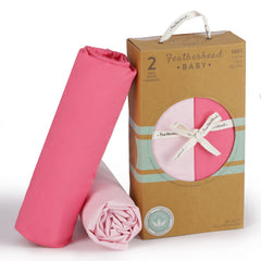 Featherhead 2-pack pink crib sheets display coordinating nursery designs for versatile decor