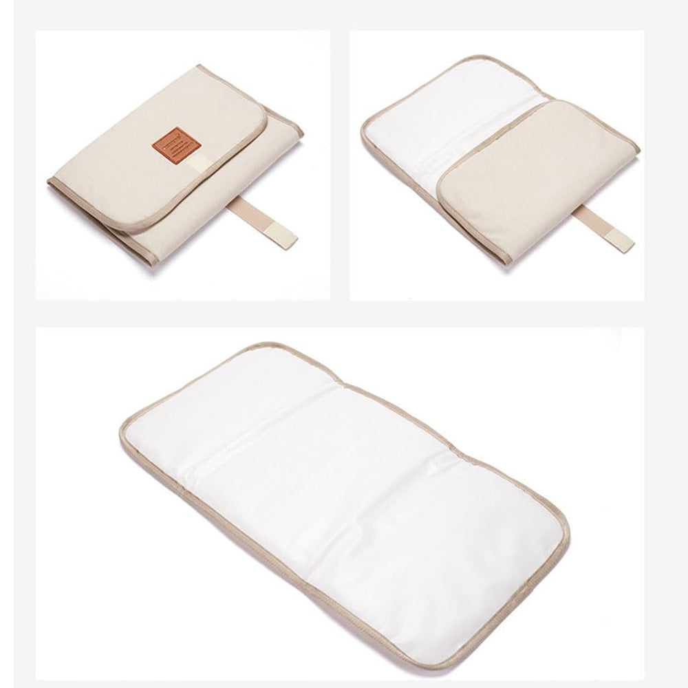 FGDTREE foldable travel changing pad in beige ready for trips
