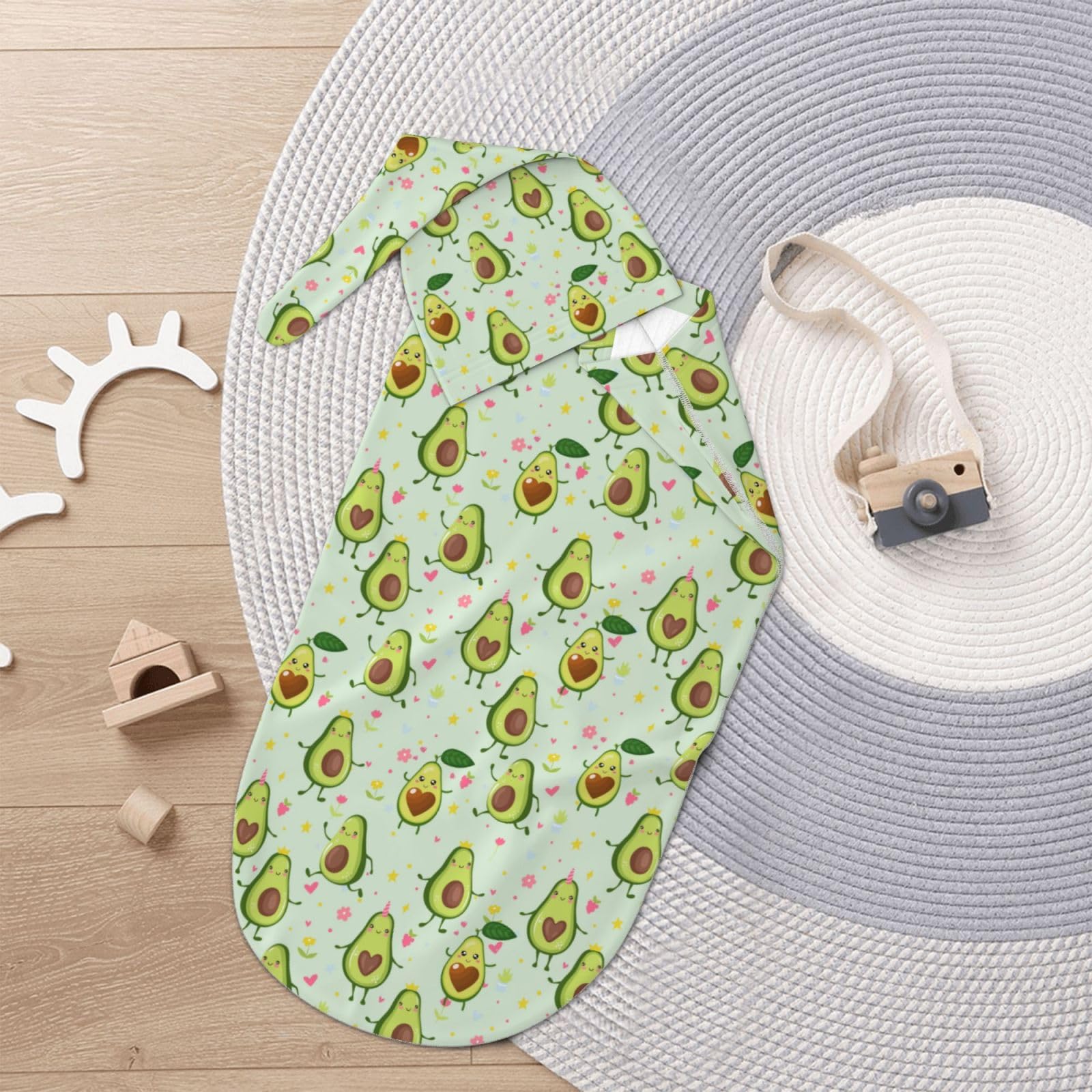 Figtihw Avocado Swaddle Blanket used as newborn photo prop for memories.