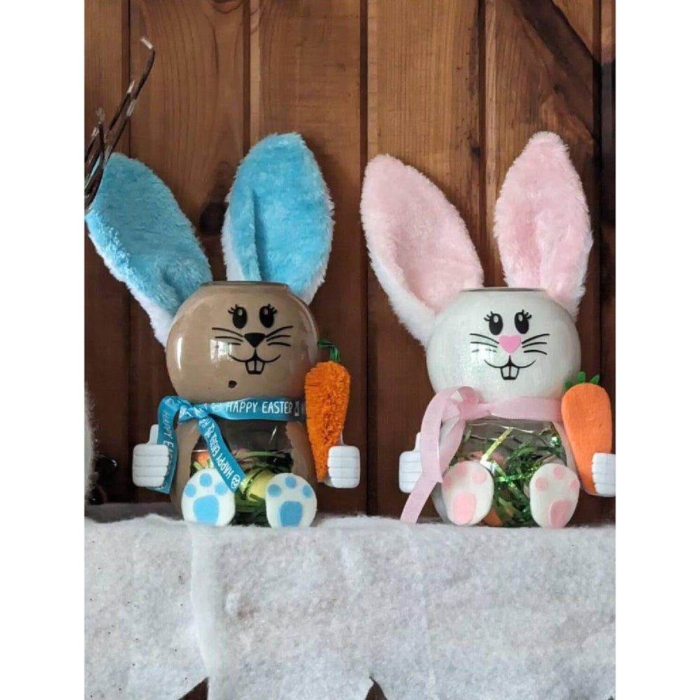 Finduat Easter bunny face window decal brightening a glass surface.