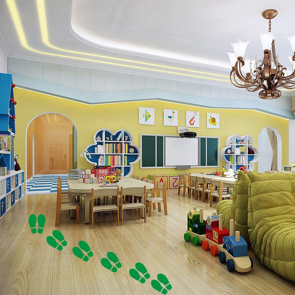 Finduat green footprint floor decals mark dance studio paths for easy movement.