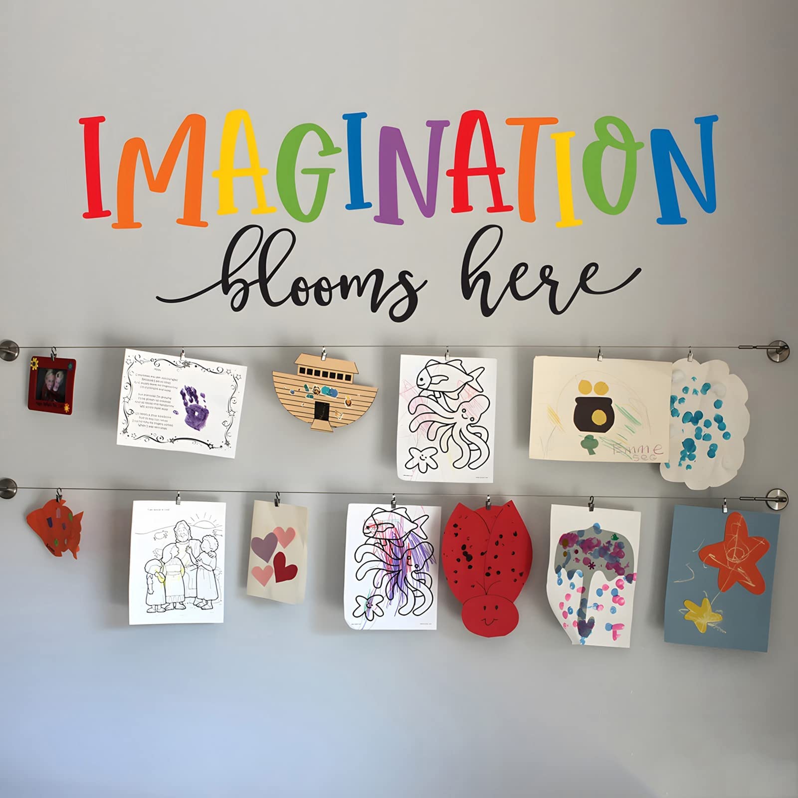 Finduat Imagination Blooms Here decal on wall to inspire classroom creativity.