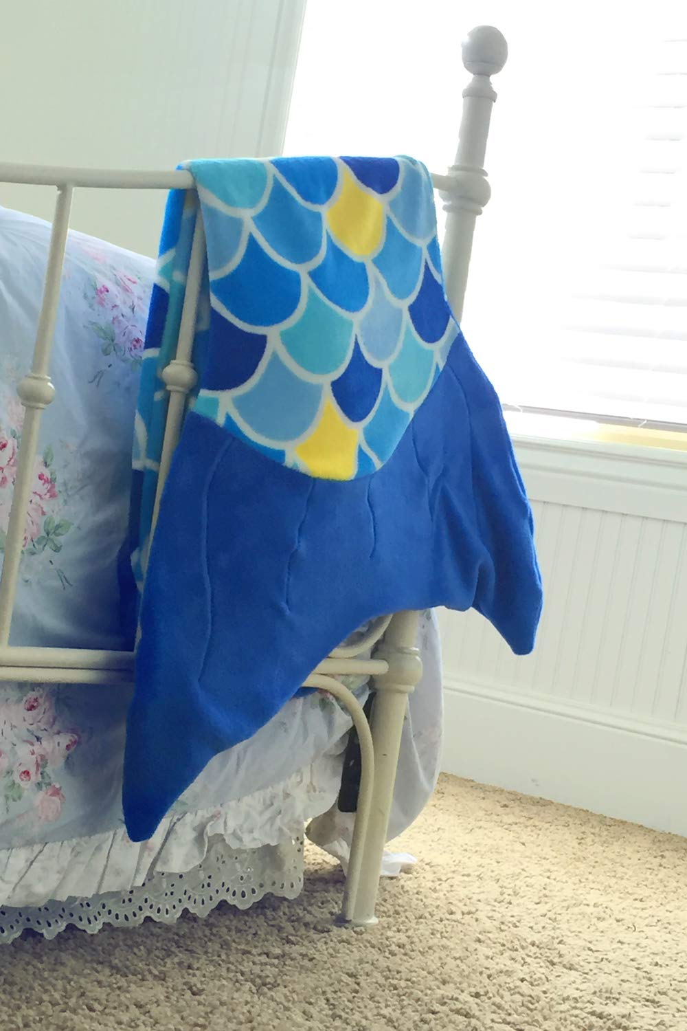 Fin Fun blanket with vibrant wave blue colors for bright bedrooms.