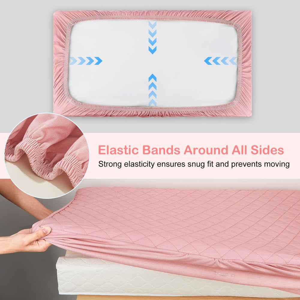 FIOBEE baby on changing pad with cover for cozy diaper times