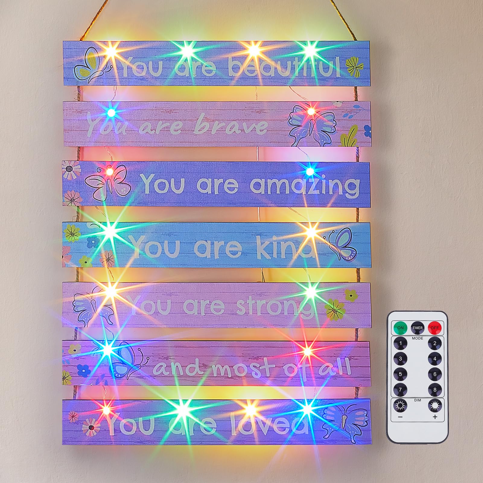 FIOBEE purple butterfly LED wall decor enhances the teen room with playful color