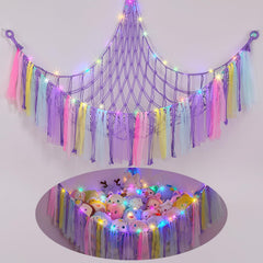 Fiobee stuffed animals hammock with LED light hanging in a nursery for cozy organization