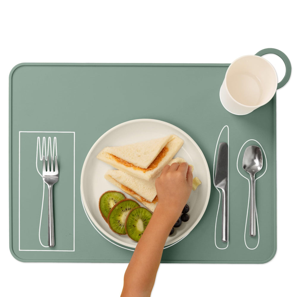Fire Rooster Kids placemat in soft green color enhances dining aesthetics.